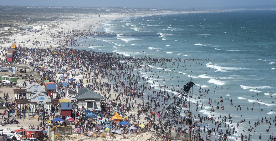 In photos: Thousands flock to Muizenberg beach to celebrate new year